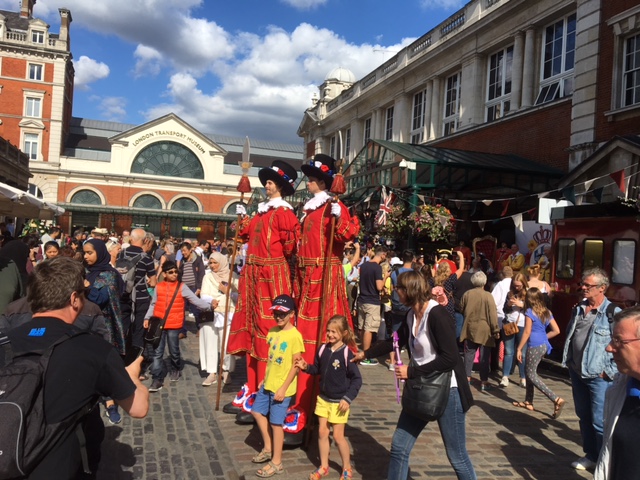 Festive costumes and street performers add life to Covent Garden