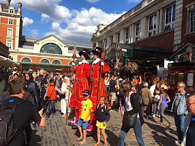 Festive costumes and street performers add life to Covent Garden